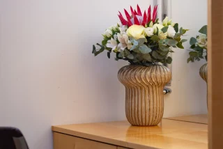 HOTEL-CREINA---deluxe-suite---3-second-double-bed-with-flowers